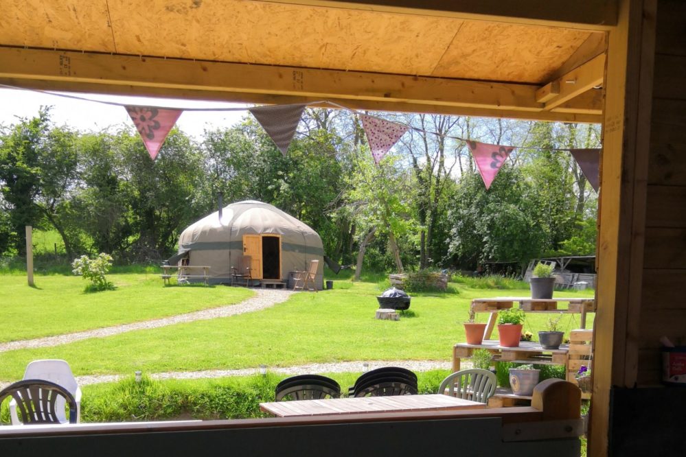 Daiy yurt seen from inside the indoor/outdoor shelter room