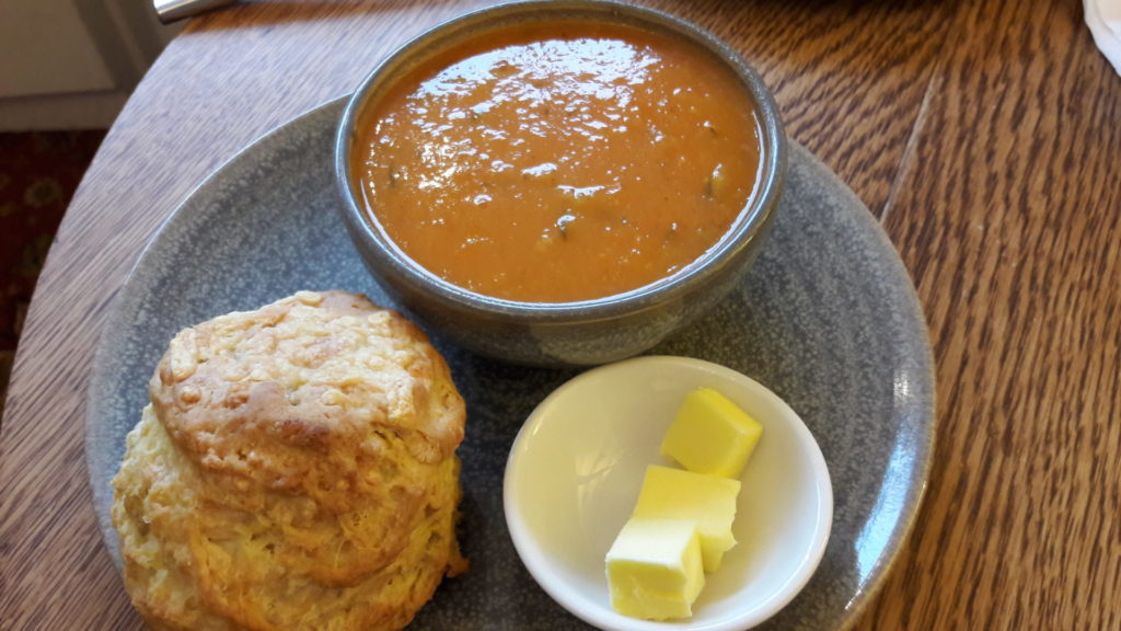 Bowl of soup and cheese scone