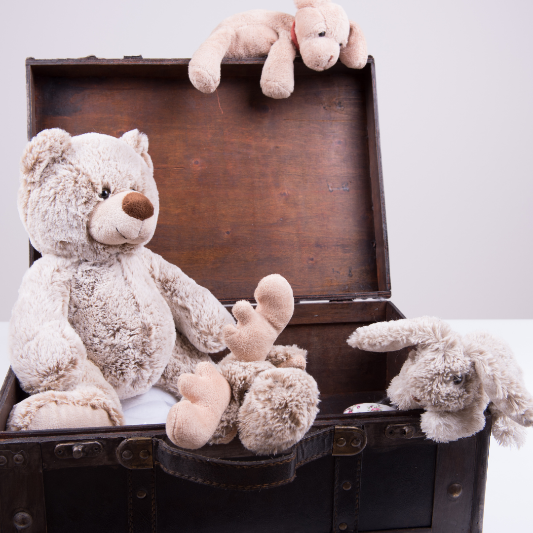 Packing for a glamping break - Suitcase with teddies in
