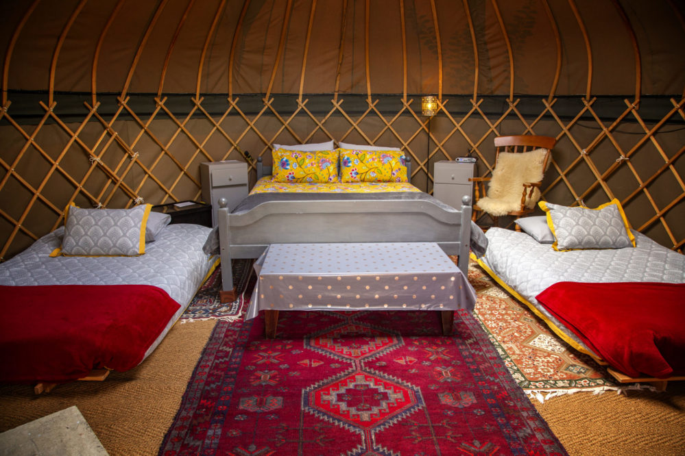 View of the beds inside Daisy at Campden Yurts
