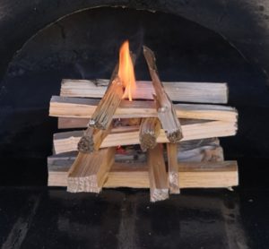 A stack of kindling wood just being lit