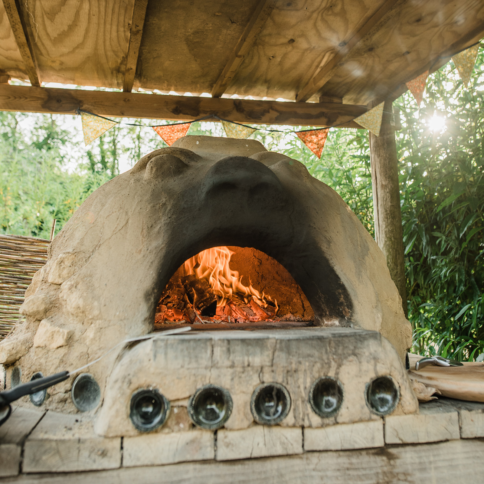 Sustainable glamping - our homemade cob pizza oven